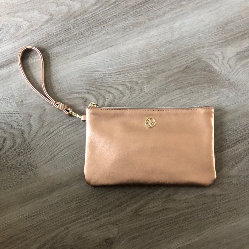 Woman’s Aa Studio Rose gold wrists clutch